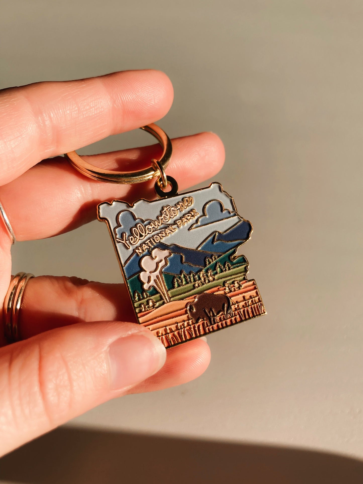 Yellowstone Gold Enamel Keychain | National Park Key Ring | Soft Enamel Illustrated Keychain | Yellowstone National Park Gift | 1.5"